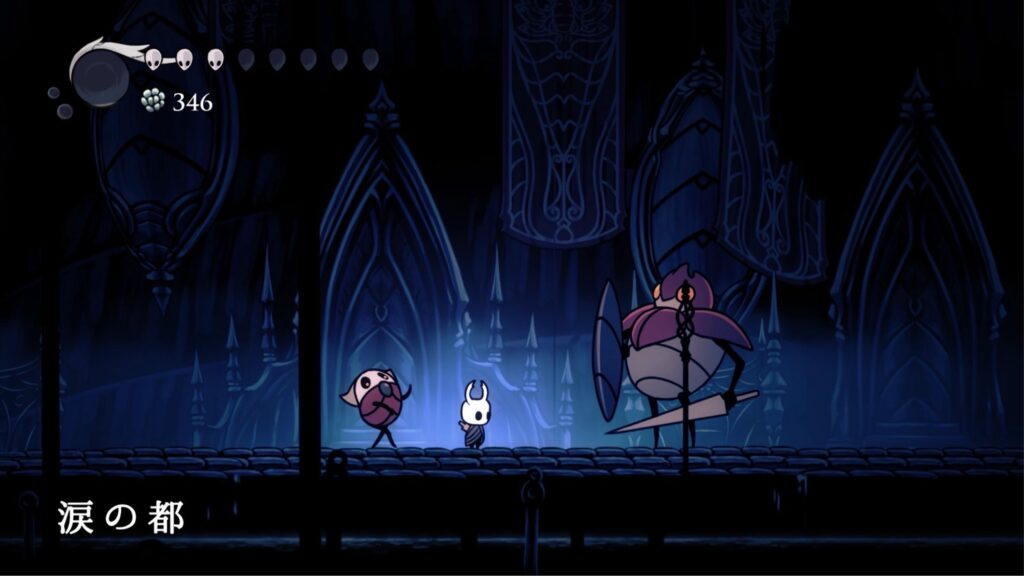 涙の都。雨音の中、青く薄暗い光はうっすらと荒廃した建物を照らす。